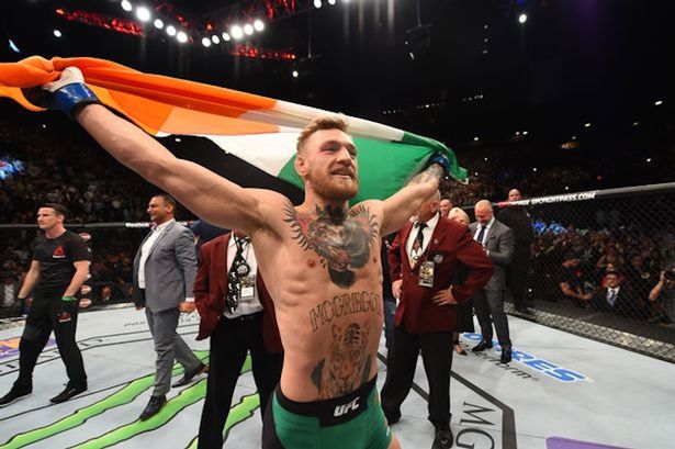 Conor-McGregor-of-Ireland-reacts-to-his-victory-over-Jose-Aldo-of-Brazil-in-their-UFC-featherweight-championship-bout-1.jpg